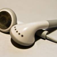a pair of white earphones